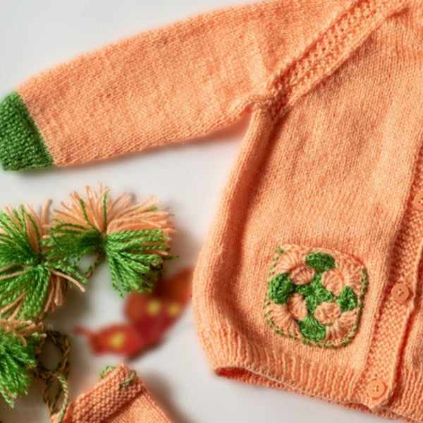 Peach Handknitted Woollen Set for infants. The set includes a unisex sweater, cap and booties.  - thesaffronsaga